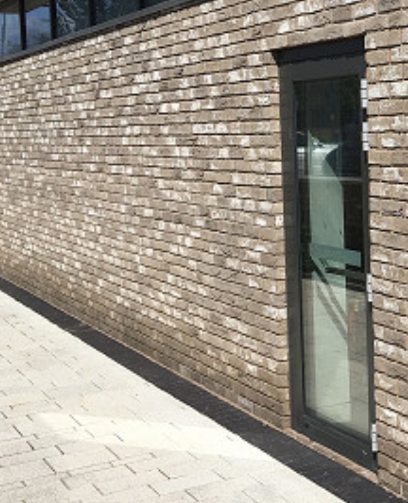 Modern light brick commercial building wall finish
