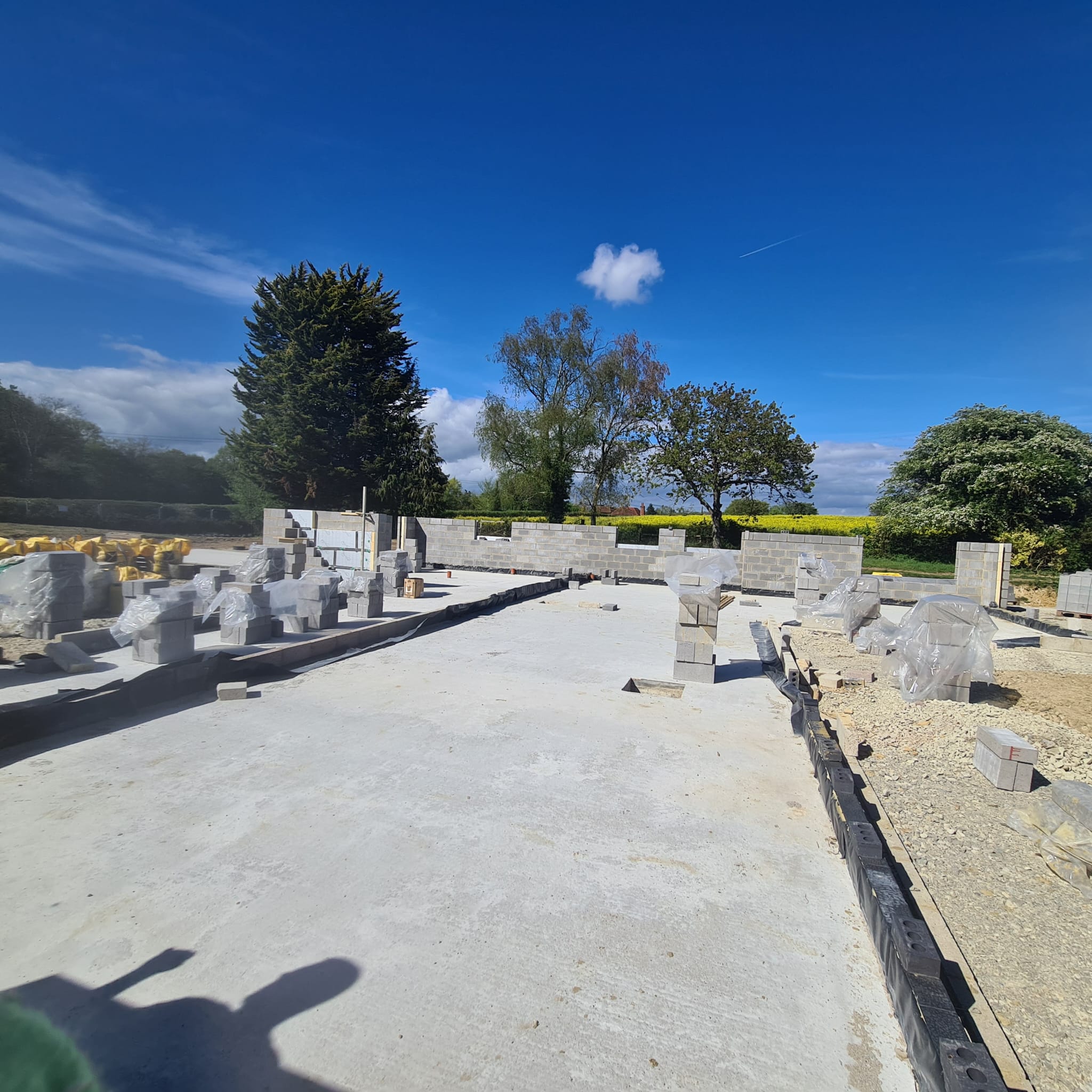 New build foundation slab with block walls starting
