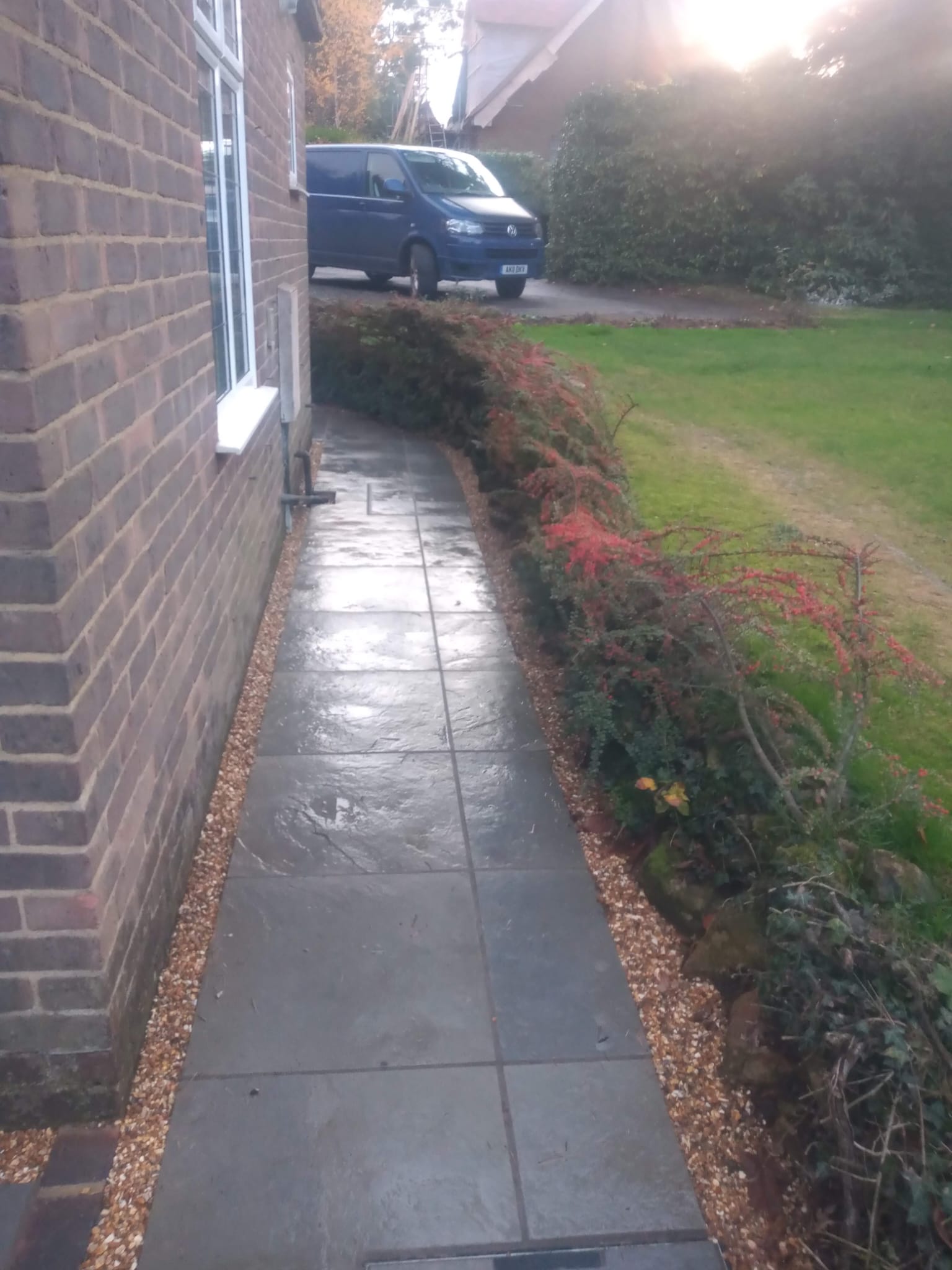 Slate pathway along side of house with gravel edging