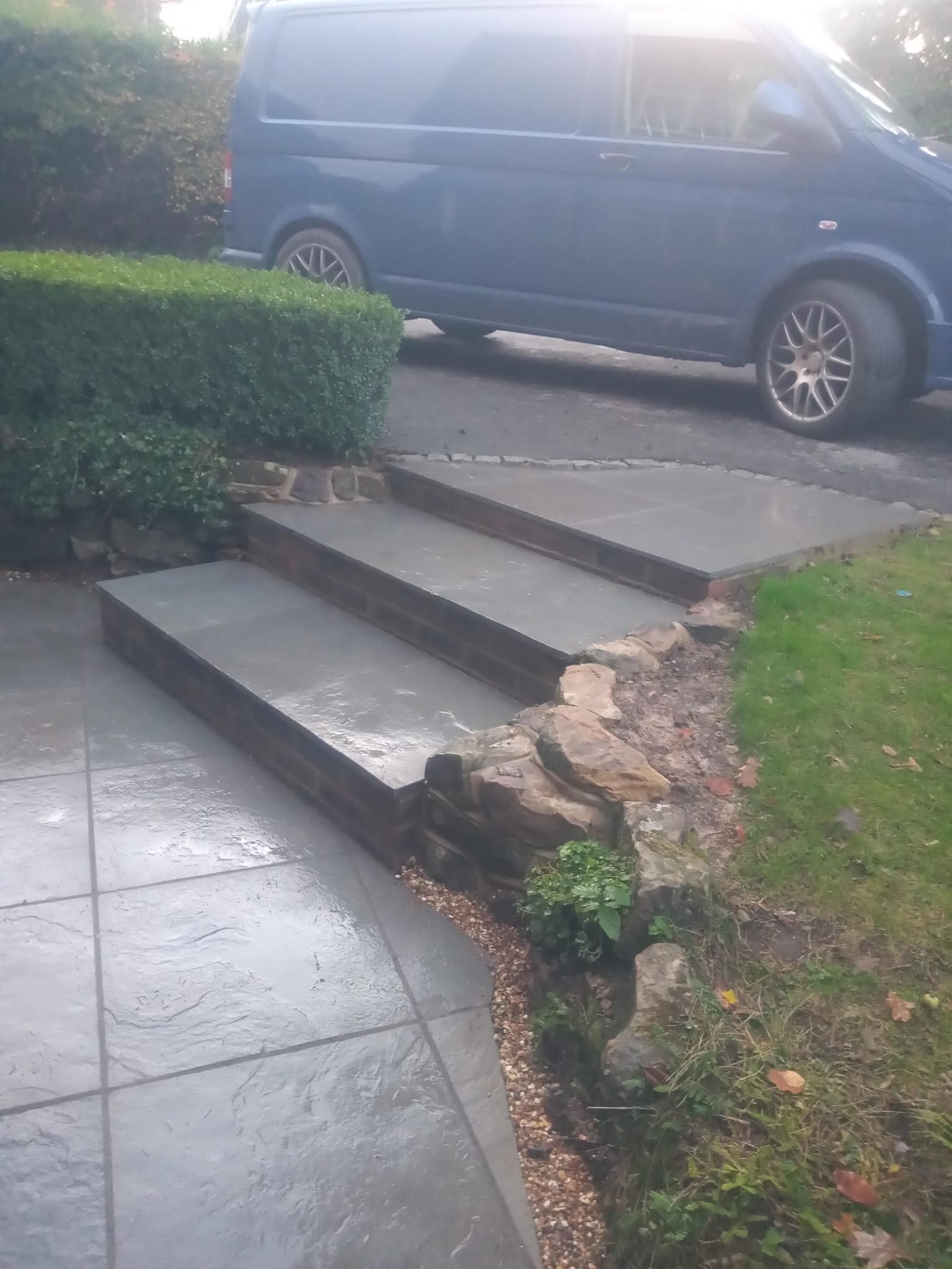 Slate steps with natural stone edging to front entrance